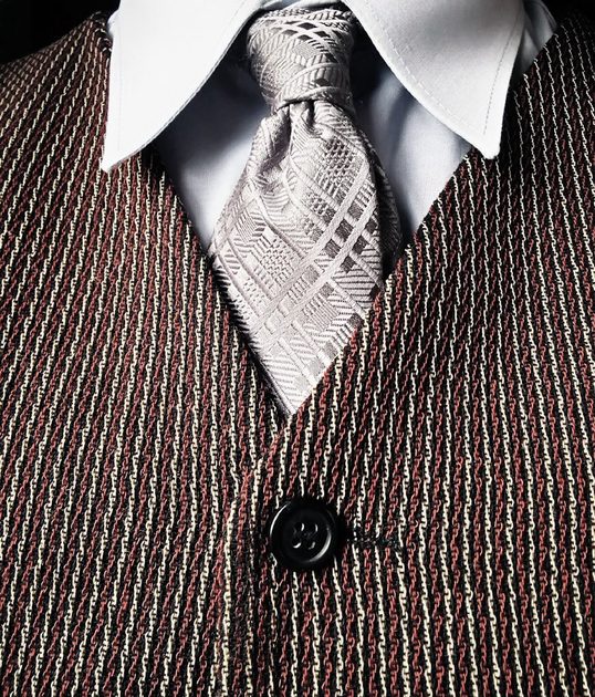 Close-up of quality clothing details including stitching and buttons